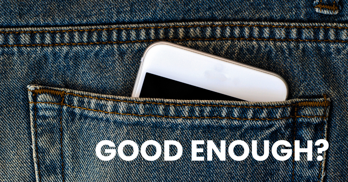 Small business owner with phone in pocket
